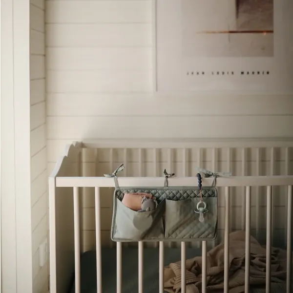 Mushie Crib Pocket | Roman Green