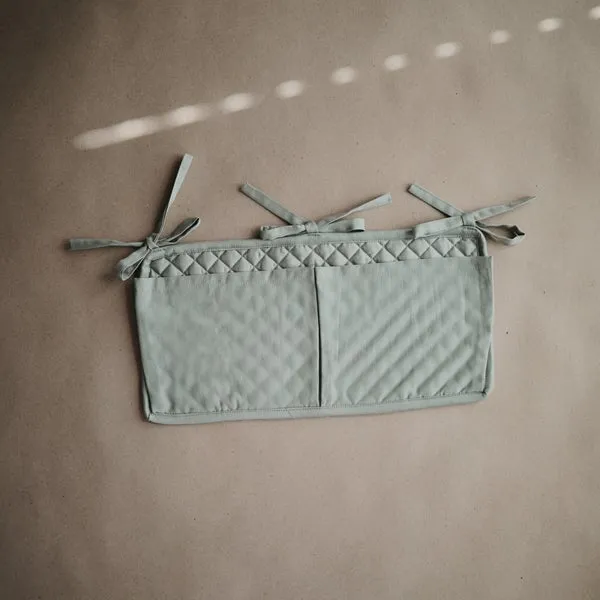 Mushie Crib Pocket | Roman Green