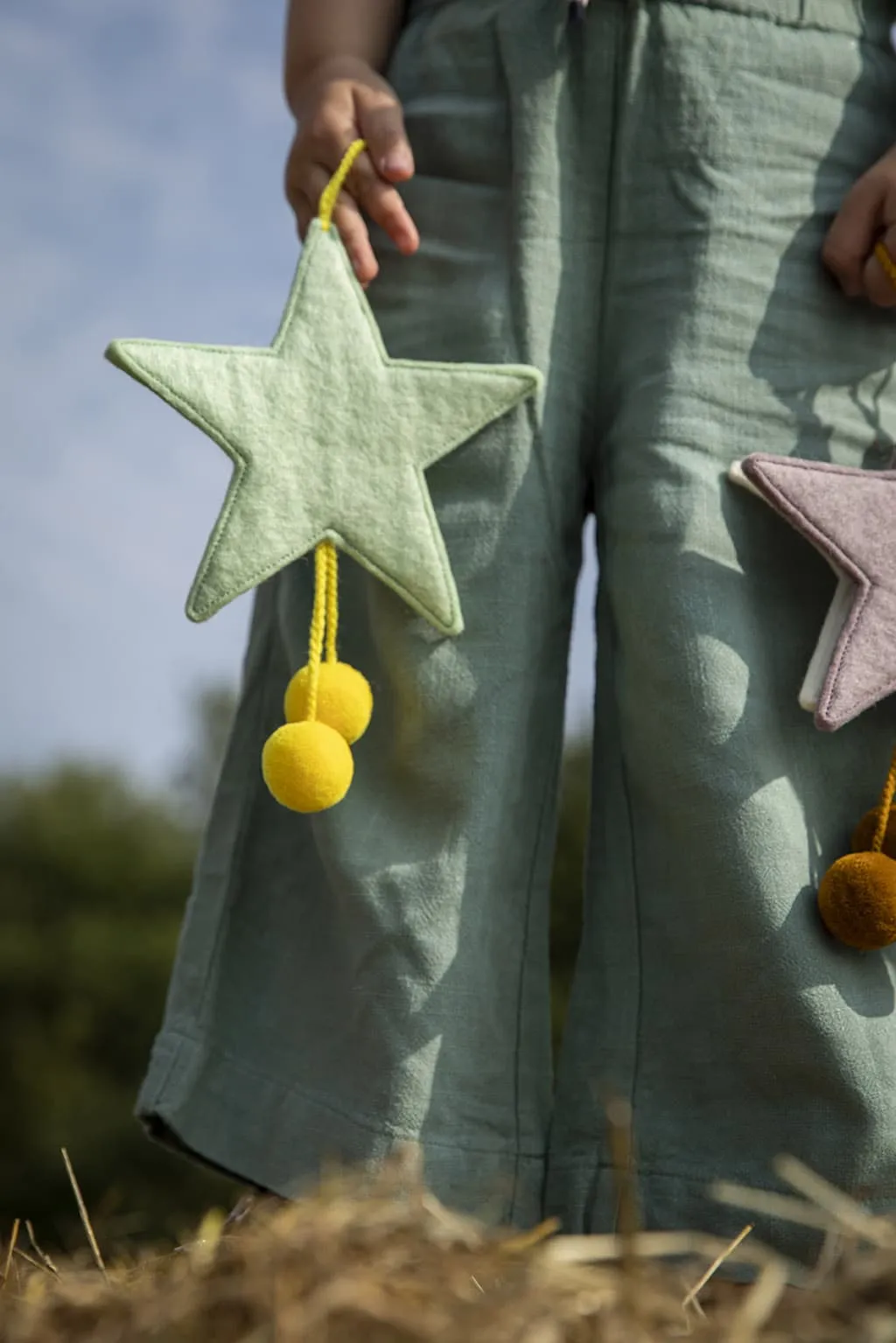 Muskhane Star with Pom Poms | Mint   Sulphur Flower